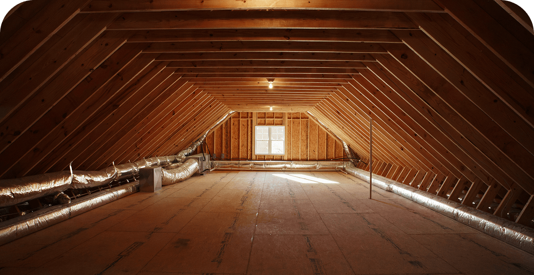 Attic interior with exposed insulation